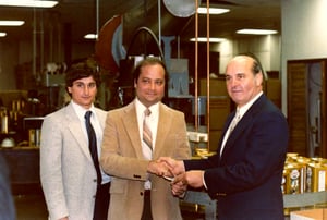 Tony Basile, left, learned from his brother Joseph, center, c. 1985